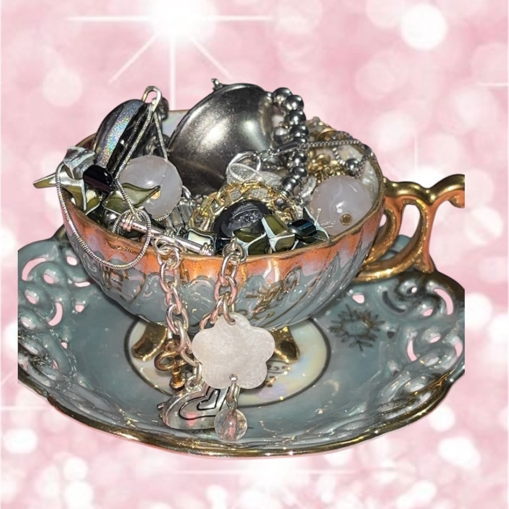 Elegant Mystery  mini tea cup and saucer  filled over with Gorgeous Jewelry